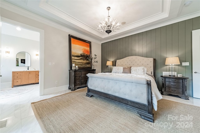 tiled bedroom with connected bathroom, sink, an inviting chandelier, and crown molding