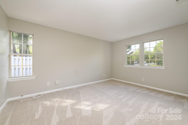 view of carpeted spare room