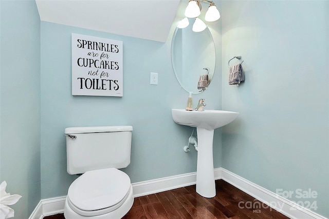 16404 Grassy Creek Dr, Huntersville, NC 28078 - half bath featuring wood finished floors, baseboards, and toilet