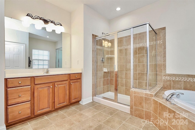 16404 Grassy Creek Dr, Huntersville, NC 28078 - bathroom with a stall shower, tile patterned floors, a bath, and vanity