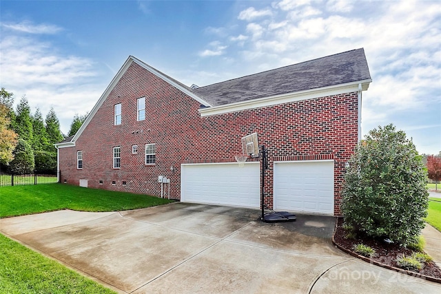 16404 Grassy Creek Dr, Huntersville, NC 28078 - view of side of property featuring brick siding, driveway, an attached garage, a shingled roof, and crawl space