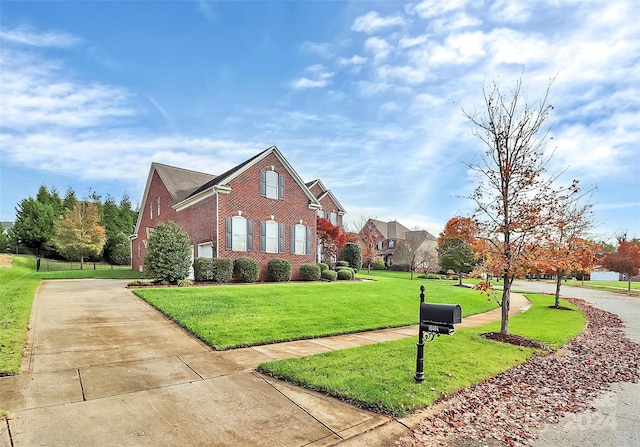 16404 Grassy Creek Dr, Huntersville, NC 28078 - view of front of home with driveway, brick siding, and a front yard