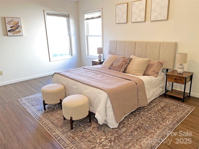 bedroom featuring dark hardwood / wood-style floors