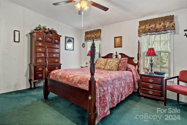 carpeted bedroom featuring ceiling fan, a textured ceiling, and ornamental molding