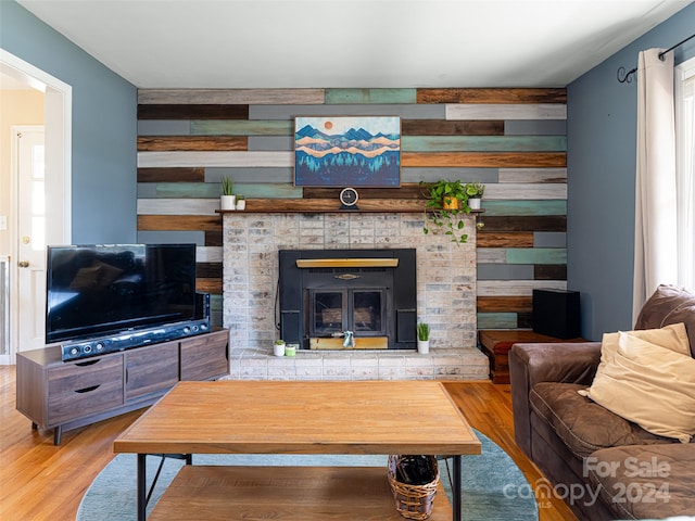 living room featuring hardwood / wood-style floors and a fireplace