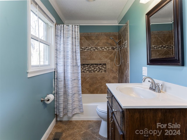 full bathroom featuring crown molding, vanity, a textured ceiling, tile patterned flooring, and shower / tub combo with curtain