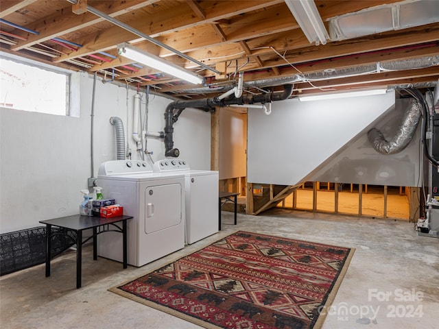 basement with washer and dryer