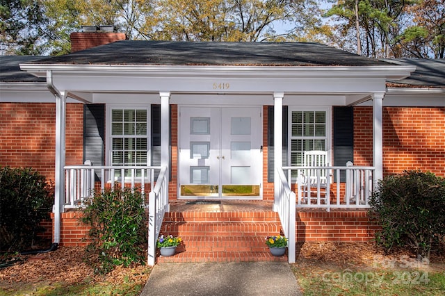 property entrance with a porch