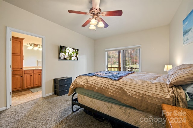 688 Olympic Dr Unit 2, Whittier, NC 28789 - bedroom featuring light carpet, ensuite bathroom, baseboards, and a ceiling fan