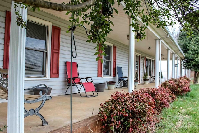 view of patio featuring a porch