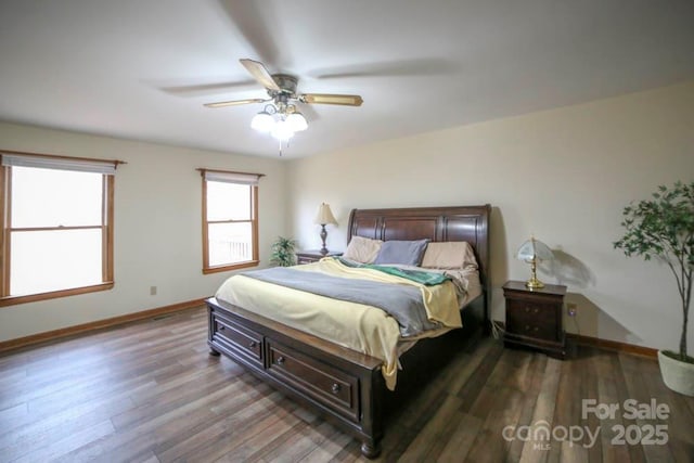 bedroom with ceiling fan and hardwood / wood-style floors