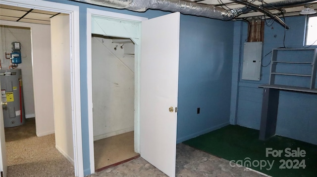 basement with electric panel and water heater