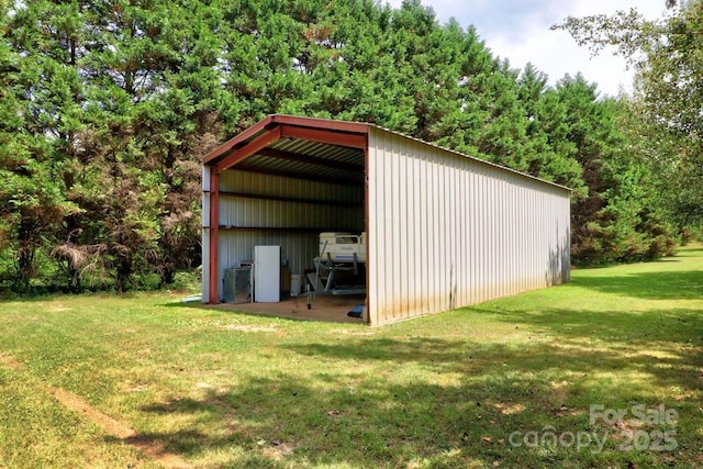 view of outdoor structure with a lawn