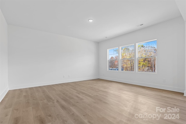 183 Sugar Hill Rd, Troutman, NC 28166 - empty room with light wood-style flooring, baseboards, and recessed lighting