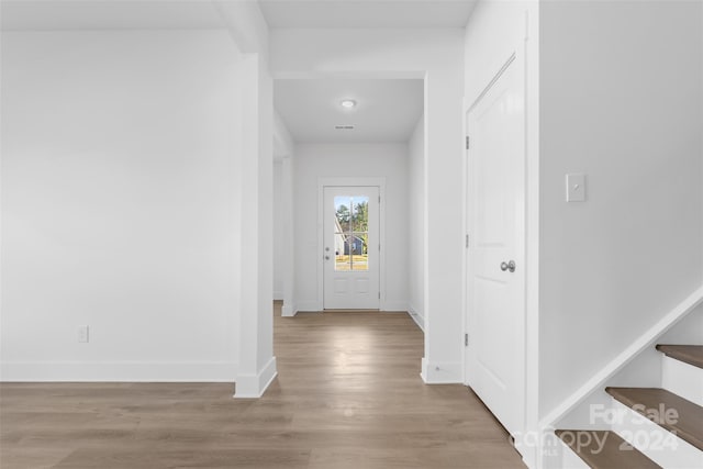 183 Sugar Hill Rd, Troutman, NC 28166 - corridor featuring wood finished floors, baseboards, and stairway