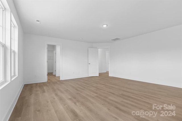 183 Sugar Hill Rd, Troutman, NC 28166 - spare room with baseboards, light wood finished floors, plenty of natural light, and recessed lighting