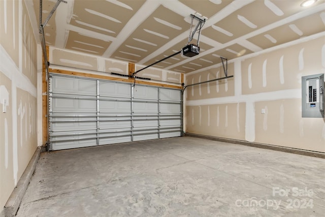 183 Sugar Hill Rd, Troutman, NC 28166 - garage with a garage door opener and electric panel