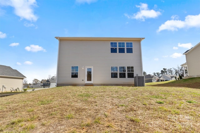 183 Sugar Hill Rd, Troutman, NC 28166 - back of property with a yard and central AC unit