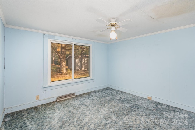 carpeted spare room featuring ceiling fan, crown molding, and a textured ceiling