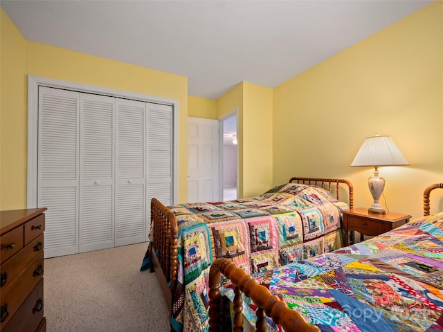 carpeted bedroom featuring a closet