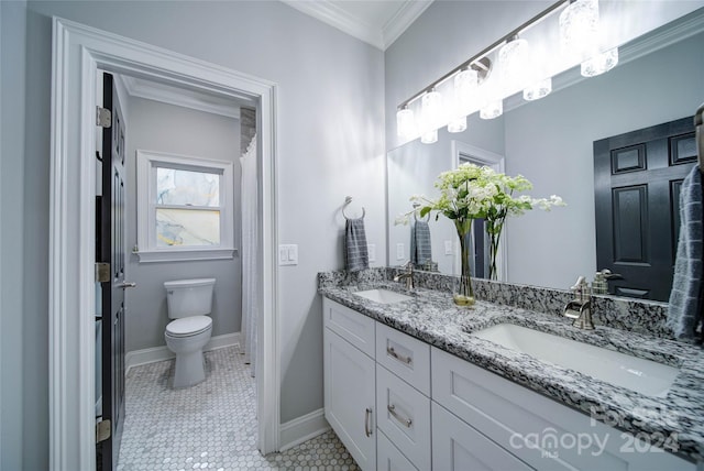 bathroom with tile patterned floors, vanity, toilet, and crown molding