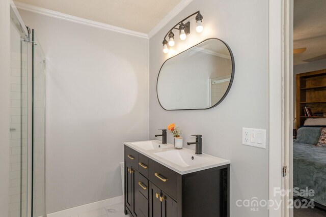 bathroom featuring vanity and ornamental molding