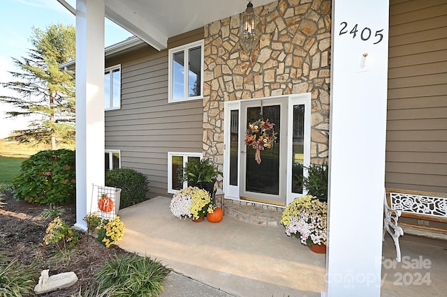 entrance to property with covered porch