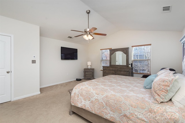 bedroom featuring ceiling fan, light colored carpet, and lofted ceiling