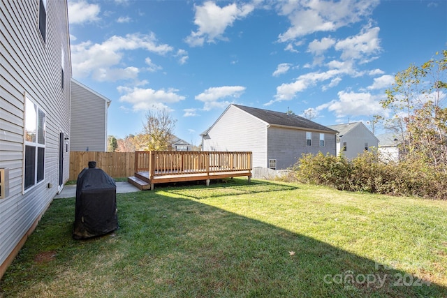 view of yard with a deck