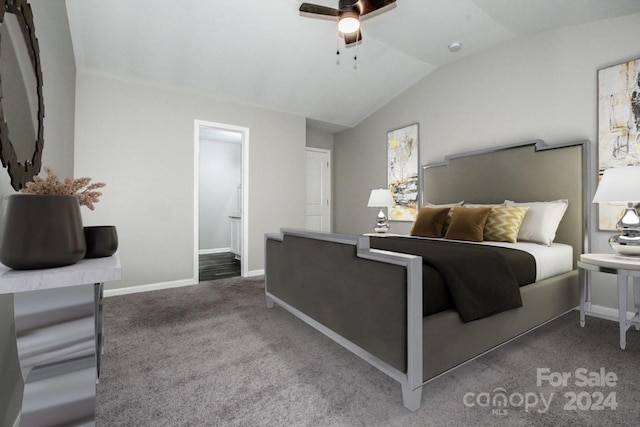 bedroom featuring connected bathroom, ceiling fan, carpet, and lofted ceiling