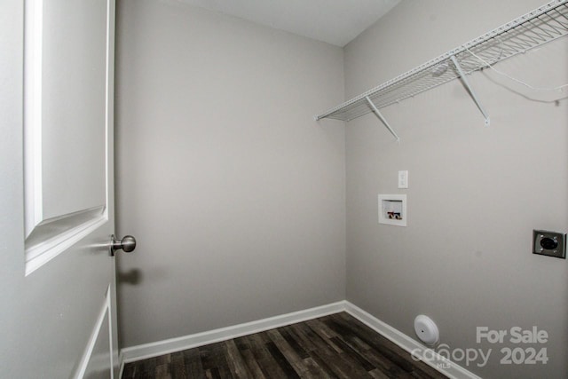 clothes washing area with electric dryer hookup, dark hardwood / wood-style flooring, and washer hookup