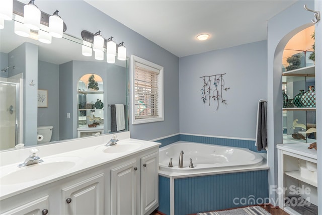 full bathroom featuring toilet, vanity, and plus walk in shower