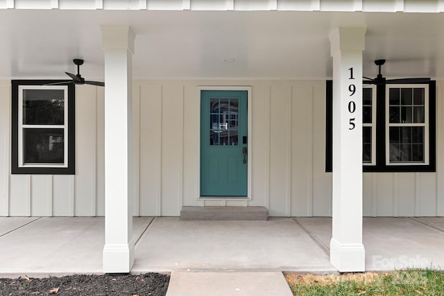 entrance to property with ceiling fan