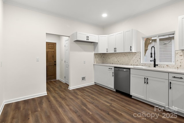 kitchen with backsplash, stainless steel dishwasher, dark wood-type flooring, sink, and white cabinetry