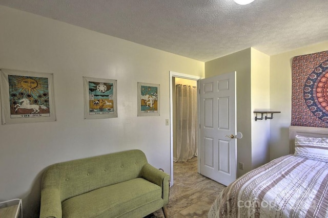 bedroom with a textured ceiling