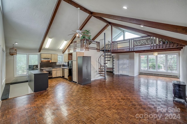 33 Summit Ln, Newland, NC 28657 - kitchen featuring appliances with stainless steel finishes, dark countertops, under cabinet range hood, a ceiling fan, and high vaulted ceiling