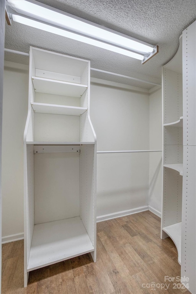 33 Summit Ln, Newland, NC 28657 - spacious closet featuring wood finished floors