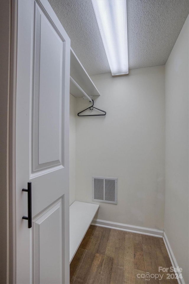 33 Summit Ln, Newland, NC 28657 - walk in closet featuring dark wood-style flooring