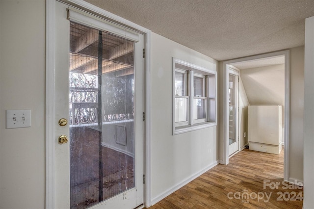 33 Summit Ln, Newland, NC 28657 - hall with wood finished floors, a textured ceiling, and baseboards