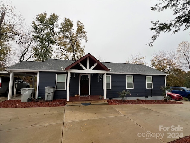 view of front of house featuring a carport