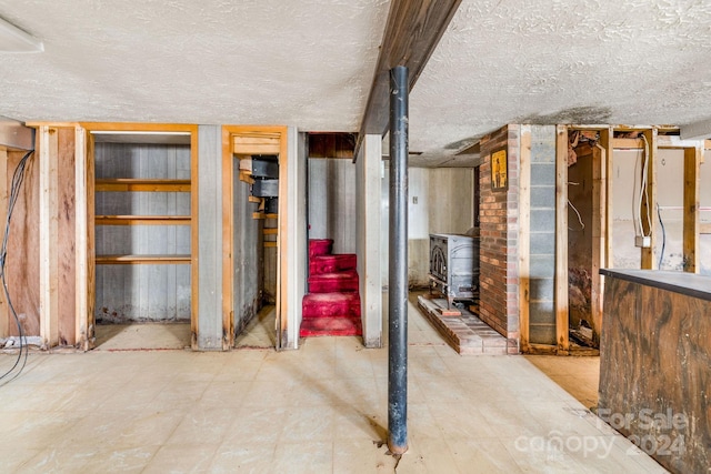 interior space with a textured ceiling