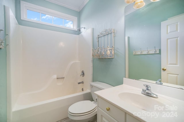 full bathroom with ornamental molding, vanity, toilet, and bathtub / shower combination