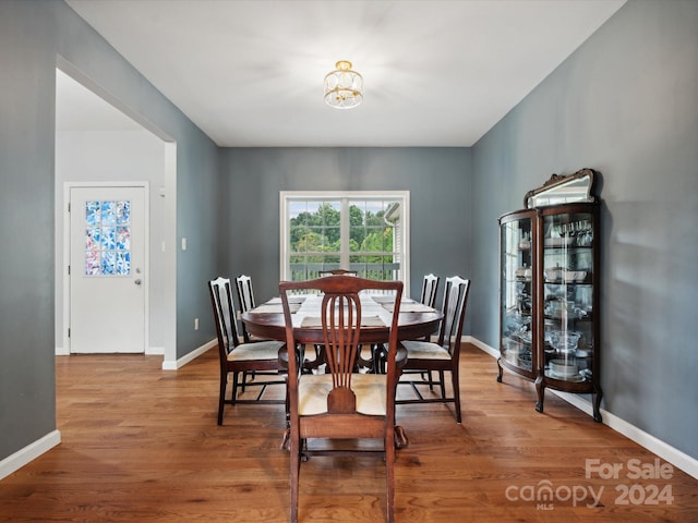 dining space featuring hardwood / wood-style flooring