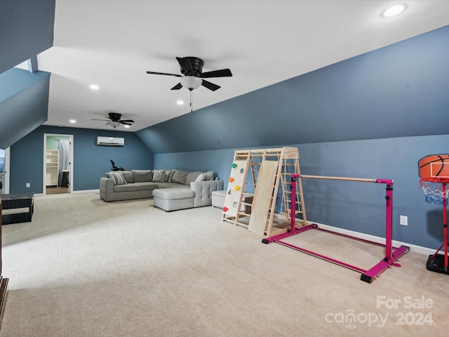 playroom with lofted ceiling, carpet flooring, ceiling fan, and a wall mounted air conditioner