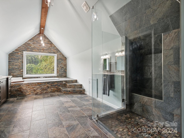 bathroom featuring lofted ceiling with beams, vanity, and separate shower and tub