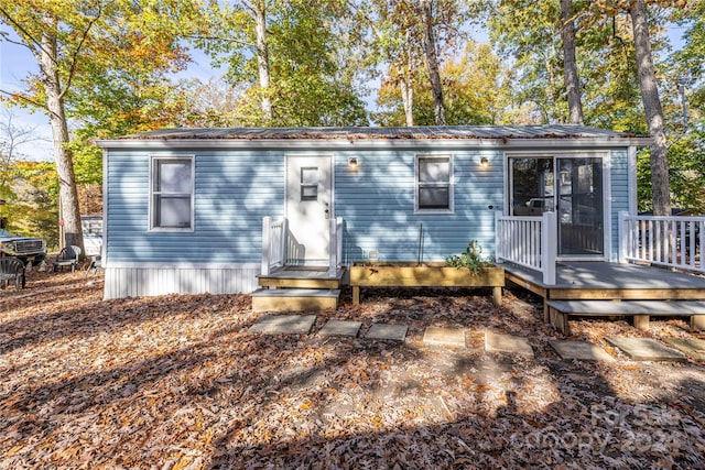 view of front of property with a deck