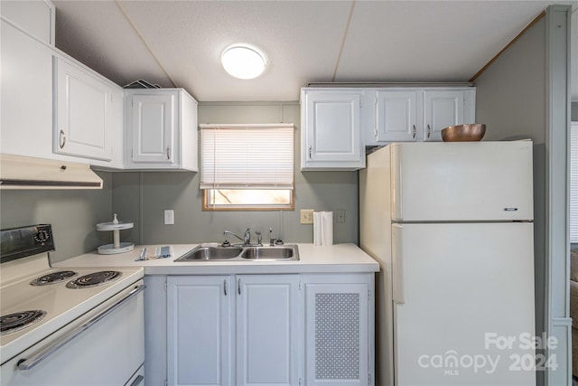 kitchen with a textured ceiling, white appliances, sink, and white cabinets