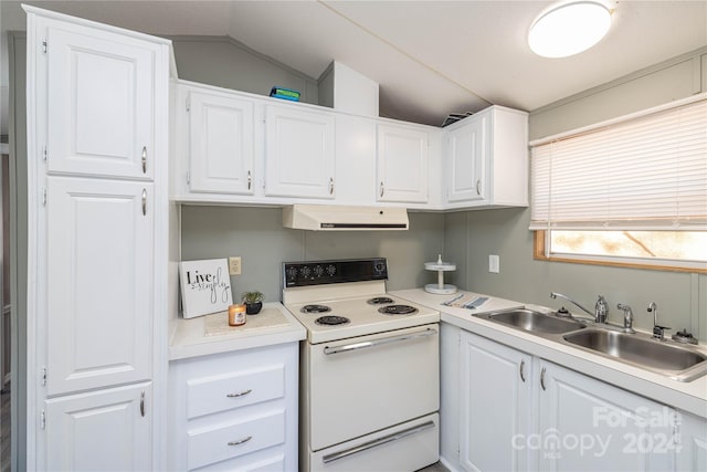 kitchen featuring white cabinets, sink, vaulted ceiling, and electric range