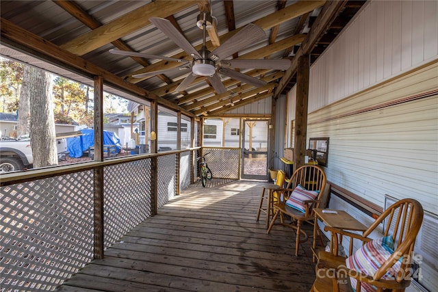 wooden deck with ceiling fan