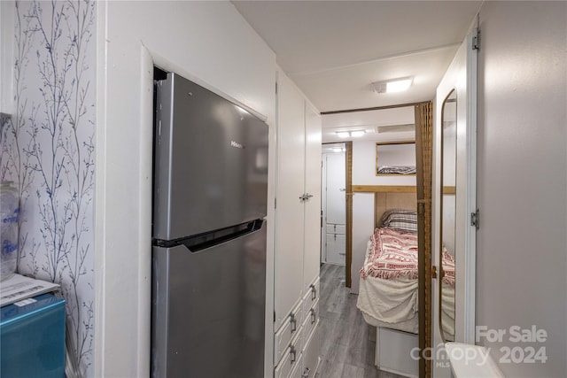 bathroom featuring wood-type flooring